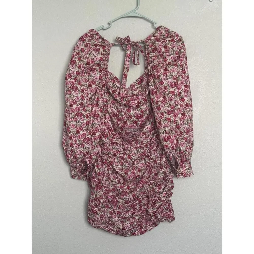 This beautiful Nasty Gal mini dress in size 4 features a vibrant floral print - Picture 2 of 12